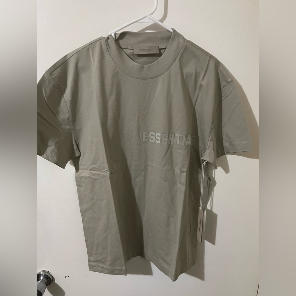 Brand new essentials tshirt Sz S